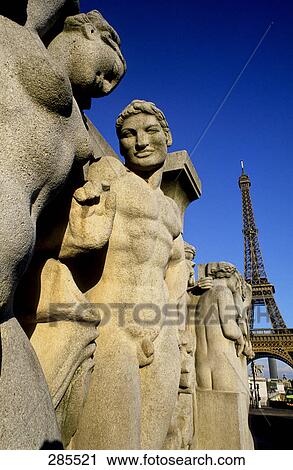 Sculpture in front of tower, Eiffel Tower, Trocadero Fountains, Paris, Ile-de-France, France View Large Photo Image Stock Image - Sculpture in front of tower, Eiffel Tower, Trocadero Fountains, Paris, Ile-de-France, France . Fotosearch