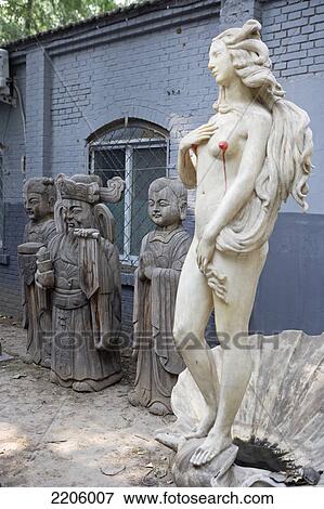 Sculptures in front of building View Large Photo Image Stock Photo - Sculptures in front of building . Fotosearch