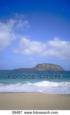 Sea waves on sandy beach, Playa De Las Conchas, Canary Islands, Spain View Large Photo Image Stock Photo - Sea waves on sandy beach, Playa De Las Conchas, Canary Islands, Spain . Fotosearch