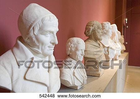 Side profile of statues in row View Large Photo Image Stock Photo - Side profile of statues in row . Fotosearch