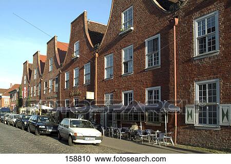 Sidewalk cafe along with Dutch Quarter, Potsdam, Brandenburg, Germany View Large Photo Image Stock Image - Sidewalk cafe along with Dutch Quarter, Potsdam, Brandenburg, Germany . Fotosearch