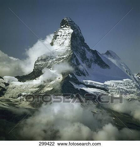 Snowcapped mountain peak under blue sky, Matterhorn, Switzerland View Large Photo Image Stock Image - Snowcapped mountain peak under blue sky, Matterhorn, Switzerland . Fotosearch