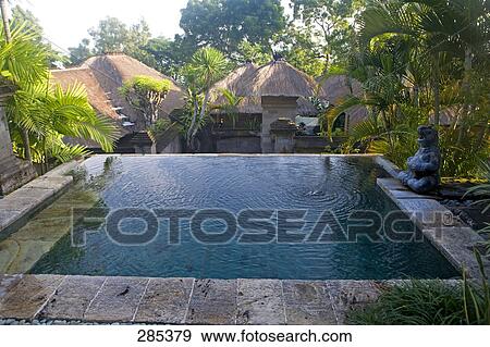 Spa pool at resort, Bali, Indonesia View Large Photo Image Stock Photo - Spa pool at resort, Bali, Indonesia . Fotosearch