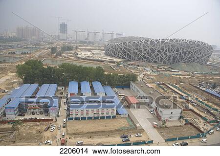 Picture - Stadium under construction in city, The Bird's Nest, Beijing, China . Fotosearch