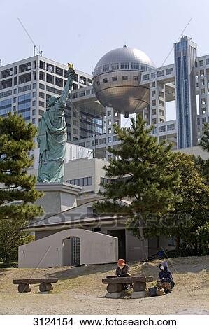 Statue of Liberty replica in front of the Fuji TV building, Tokyo, Japan, low angle view View Large Photo Image Picture - Statue of Liberty replica in front of the Fuji TV building, Tokyo, Japan, low angle view . Fotosearch