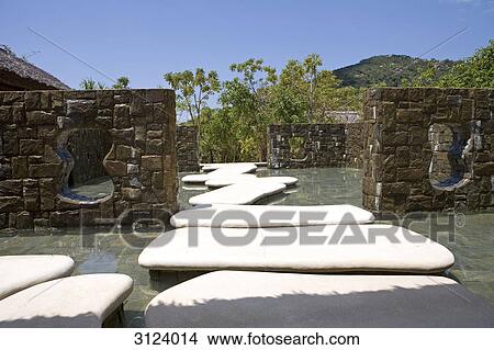 Stepping stone in the water, outdoor complex of a hotel, Nha Trang, Vietnam View Large Photo Image Picture - Stepping stone in the water, outdoor complex of a hotel, Nha Trang, Vietnam . Fotosearch