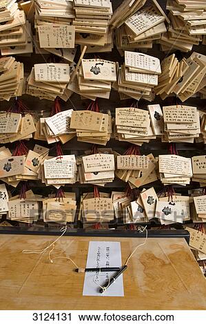 Stock Image - Strips of paper with messages, Meiji Shrine, Tokyo, Japan . Fotosearch