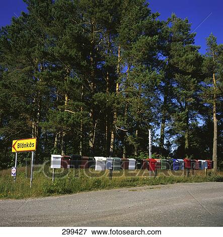 Stuga mail boxes at roadside, Sweden View Large Photo Image Stock Photo - Stuga mail boxes at roadside, Sweden . Fotosearch