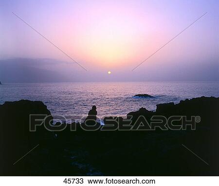 Stock Image - Sun over sea, Las Puntas, El Golfo, El Hierro, Canary Islands, Spain . Fotosearch