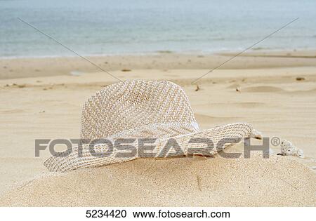 Sunhat at beach View Large Photo Image Stock Image - Sunhat at beach . Fotosearch