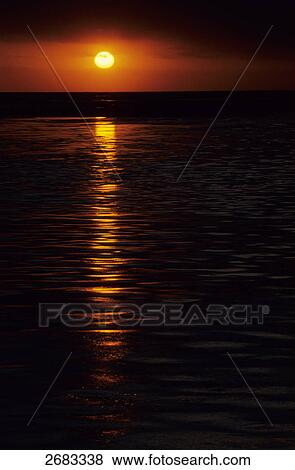 Sunset over sea, Schleswig-Holstein, Germany View Large Photo Image Stock Photo - Sunset over sea, Schleswig-Holstein, Germany . Fotosearch