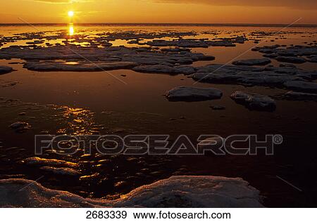 Sunset over sea, Schleswig-Holstein, Germany View Large Photo Image Stock Photo - Sunset over sea, Schleswig-Holstein, Germany . Fotosearch