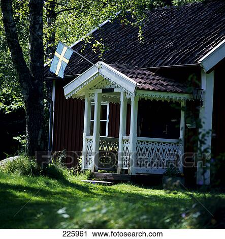 Swiss flag in front of house, Sweden View Large Photo Image Stock Image - Swiss flag in front of house, Sweden . Fotosearch