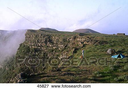 Tourist camping on mountain, El Hierro, Canary Islands, Spain View Large Photo Image Stock Photo - Tourist camping on mountain, El Hierro, Canary Islands, Spain . Fotosearch