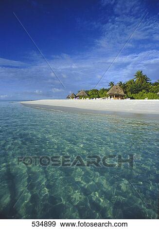 Tourist resort on beach, Thulagiri, Nord-Male-Atoll, Maldives View Large Photo Image Stock Photo - Tourist resort on beach, Thulagiri, Nord-Male-Atoll, Maldives . Fotosearch