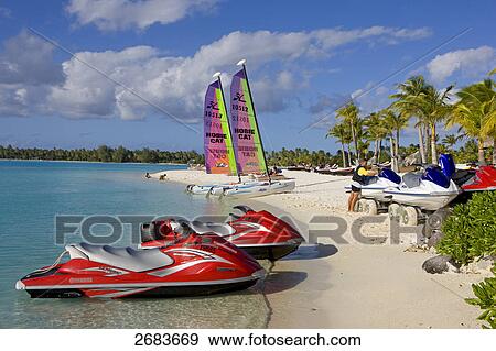 Tourists and boats on beach, Bora Bora, Society Island, French Polynesia View Large Photo Image Stock Photo - Tourists and boats on beach, Bora Bora, Society Island, French Polynesia . Fotosearch