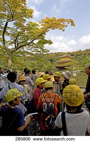 Stock Photograph - Tourists at Buddhist shrine, Kenninji Zen Temple, Kyoto, Japan . Fotosearch