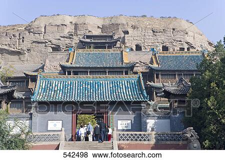 Tourists entering in temple, Yungang Buddhist Caves, Shaanxi Province, China View Large Photo Image Stock Photo - Tourists entering in temple, Yungang Buddhist Caves, Shaanxi Province, China . Fotosearch