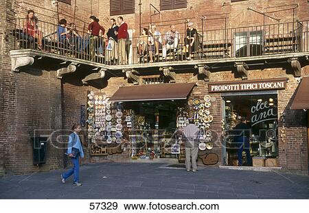 Tourists in front of store View Large Photo Image Stock Photo - Tourists in front of store . Fotosearch