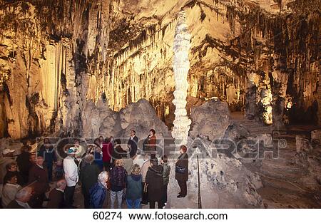 Tourists inside a limestone cave, Coves d Arta, Canary Islands, Spain View Large Photo Image Picture - Tourists inside a limestone cave, Coves d Arta, Canary Islands, Spain . Fotosearch