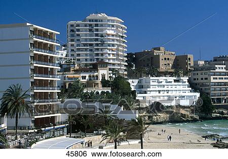 Tourists on beach, Badia de Palma, Cala Minor, Mallorca, Baleares Islands, Spain View Large Photo Image Stock Photograph - Tourists on beach, Badia de Palma, Cala Minor, Mallorca, Baleares Islands, Spain . Fotosearch