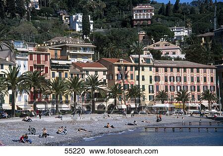 Stock Image - Tourists on beach, Santa Margherita Ligure, Italy . Fotosearch