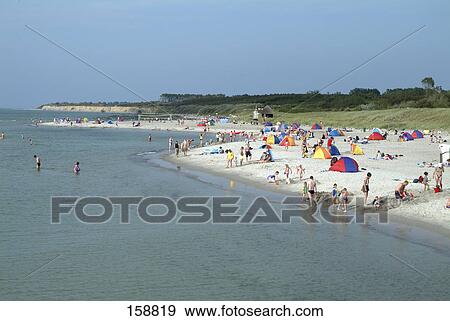 Tourists on beach, Fischland-Darss-Zingst, Wustrow, Nordvorpommern, Mecklenburg-Vorpommern, Germany View Large Photo Image Stock Photo - Tourists on beach, Fischland-Darss-Zingst, Wustrow, Nordvorpommern, Mecklenburg-Vorpommern, Germany . Fotosearch