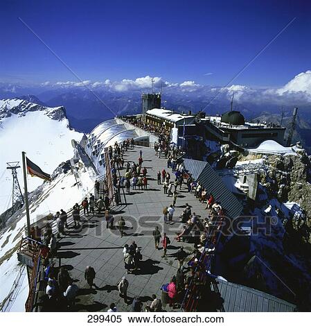 Tourists on terrace of summit station View Large Photo Image Stock Photography - Tourists on terrace of summit station . Fotosearch