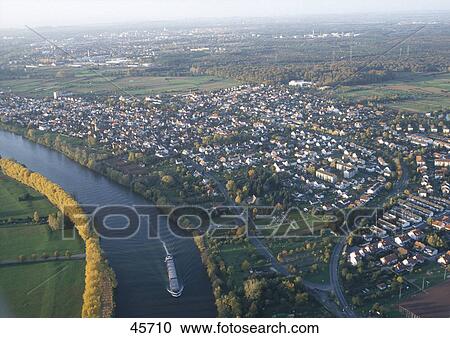 Town on riverbank, Main, Auheim, Hesse, Germany View Large Photo Image Stock Image - Town on riverbank, Main, Auheim, Hesse, Germany . Fotosearch