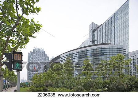 Traffic light in front of building View Large Photo Image Stock Photo - Traffic light in front of building . Fotosearch