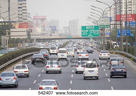 Traffic on road in city, Beijing, China View Large Photo Image Stock Photo - Traffic on road in city, Beijing, China . Fotosearch