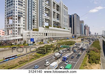 Traffic road in front of the Fuji TV building, Tokyo, Japan View Large Photo Image Stock Image - Traffic road in front of the Fuji TV building, Tokyo, Japan . Fotosearch