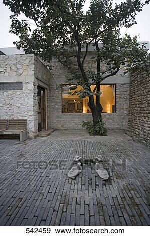Tree at entrance of building, Shang Yuan, Beijing, China View Large Photo Image Stock Photo - Tree at entrance of building, Shang Yuan, Beijing, China . Fotosearch