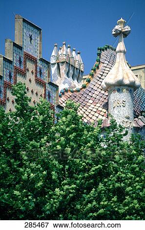 Tree in front of building, Casa Batllo, Barcelona, Catalonia, Spain View Large Photo Image Stock Photo - Tree in front of building, Casa Batllo, Barcelona, Catalonia, Spain . Fotosearch