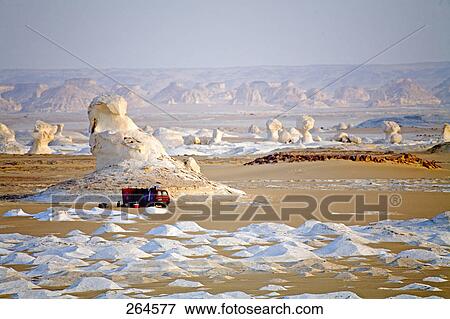 Truck parked near rock formations in desert, Farafra Oasis, Egypt View Large Photo Image Stock Photo - Truck parked near rock formations in desert, Farafra Oasis, Egypt . Fotosearch