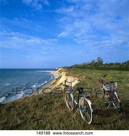 Two bicycles at coast, Ahrenshoop, Fischland-Darss, Mecklenburg-Western Pomerania, Germany View Large Photo Image Stock Photo - Two bicycles at coast, Ahrenshoop, Fischland-Darss, Mecklenburg-Western Pomerania, Germany . Fotosearch