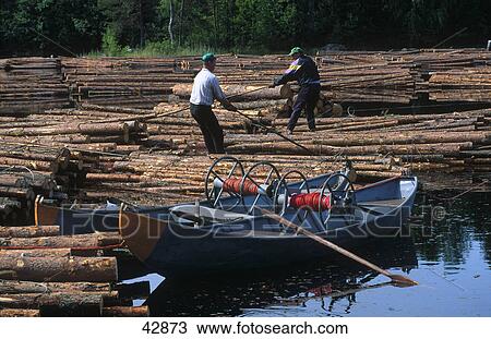 Two men working on stack of logs in water, Kallavesi Lake, Leppaevirta, Finland View Large Photo Image Stock Image - Two men working on stack of logs in water, Kallavesi Lake, Leppaevirta, Finland . Fotosearch