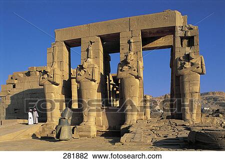 Two people standing near ruins of temple, Great Temple of Rameses II, Luxor, Egypt View Large Photo Image Stock Image - Two people standing near ruins of temple, Great Temple of Rameses II, Luxor, Egypt . Fotosearch