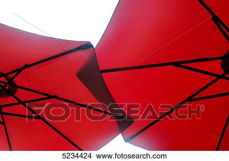 Two red parasols View Large Photo Image Picture - Two red parasols . Fotosearch