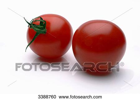 Two tomatoes, close-up View Large Photo Image Stock Image - Two tomatoes, close-up . Fotosearch