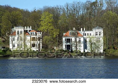Villas at waterfront, Griebnitzsee, Klein-Glienicke, Germany View Large Photo Image Stock Photograph - Villas at waterfront, Griebnitzsee, Klein-Glienicke, Germany . Fotosearch