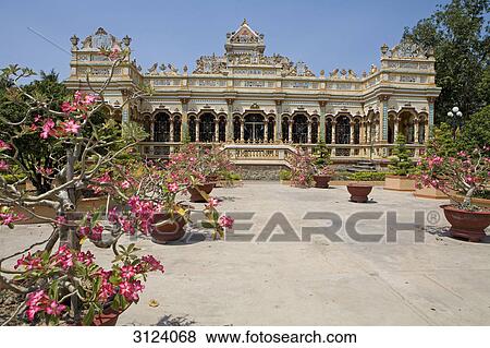Stock Photo - Vinh Trang Pagoda, Vietnam, front view . Fotosearch