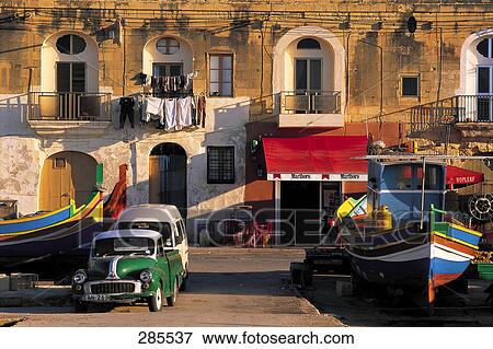 Vintage cars parked at harbor, Malta View Large Photo Image Stock Photo - Vintage cars parked at harbor, Malta . Fotosearch