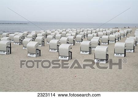 Picture - Wicker beach chairs on beach, Goehren, Ruegen, Mecklenburg-Western Pomerania, Germany . Fotosearch