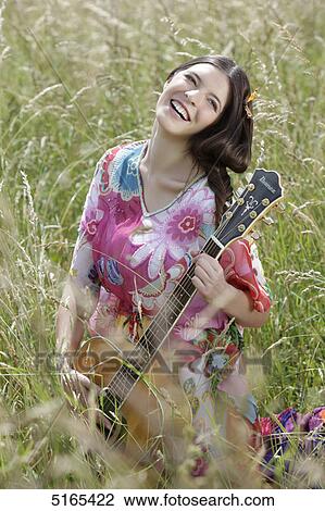 Young woman in corn field View Large Photo Image Stock Image - Young woman in corn field . Fotosearch