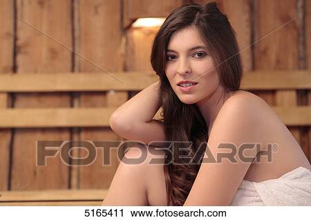Young woman in sauna View Large Photo Image Stock Image - Young woman in sauna . Fotosearch