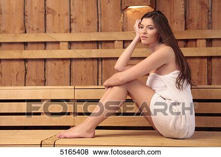 Young woman in sauna View Large Photo Image Stock Photo - Young woman in sauna . Fotosearch