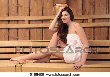 Young woman in sauna View Large Photo Image Stock Photo - Young woman in sauna . Fotosearch