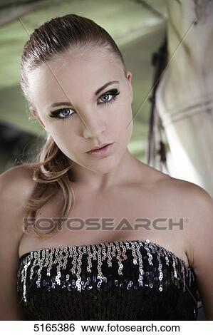 Stock Photograph - Young woman, portrait . Fotosearch