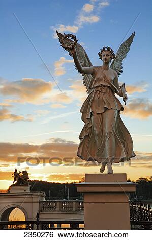 Angel sculpture in the palace garden, Schwerin Castle, Mecklenburg-pomerania, Germany View Large Photo Image Stock Photograph - Angel sculpture in the palace garden, Schwerin Castle, Mecklenburg-pomerania, Germany . Fotosearch